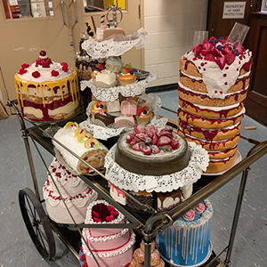 Full view of cake trolley and desserts built by Sophie Moynan.