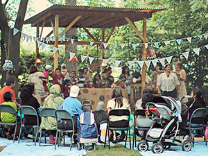 A photo of a screening of a film made in collaboration with community youth and artists from MABELLEarts' project, A Park of Many Paths.