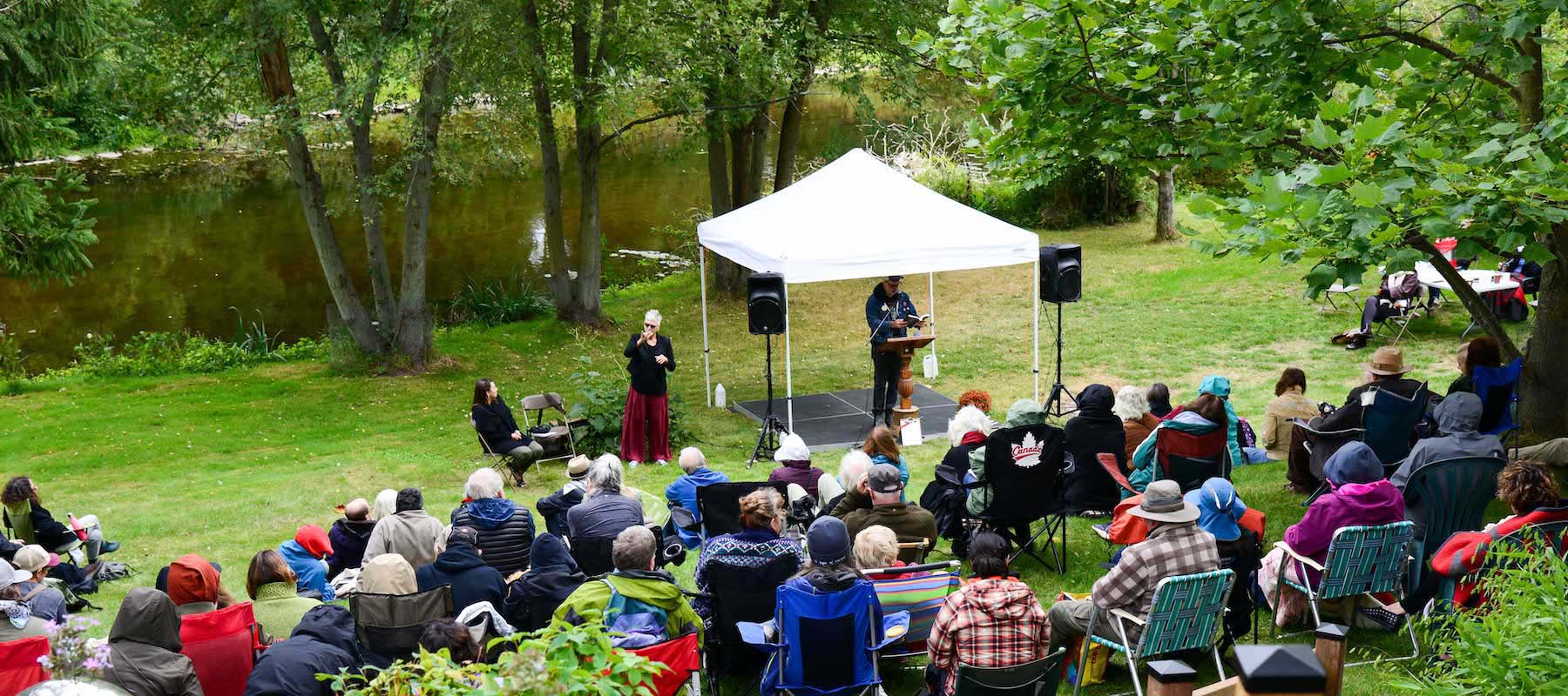 Festival goers listen to a reading at the Eden Mills Writers’ Festival. (Photo: Dan Harasymchuk)